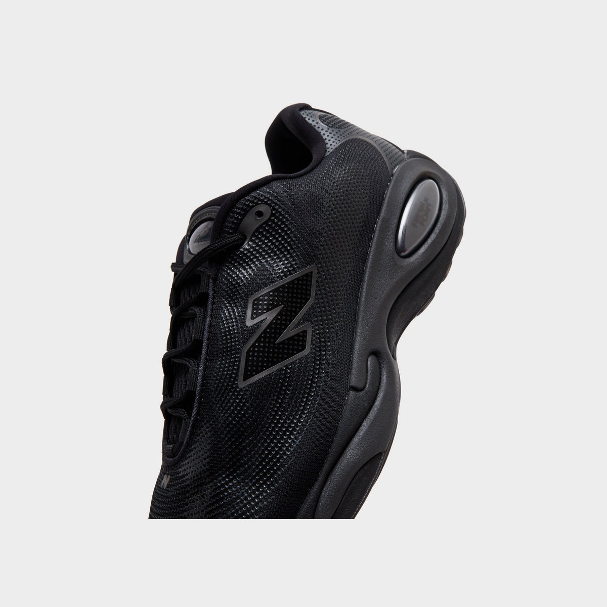 Black New Balance AC Runner