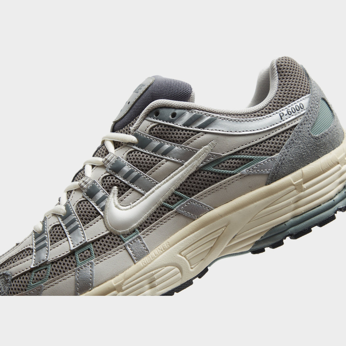 Grey Nike P-6000