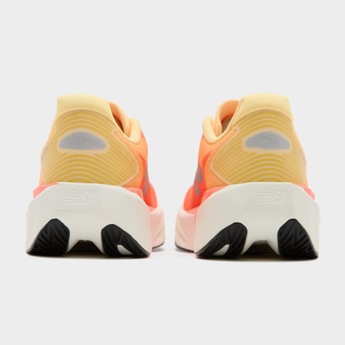 Orange New Balance FuelCell Rebel v5 Women's